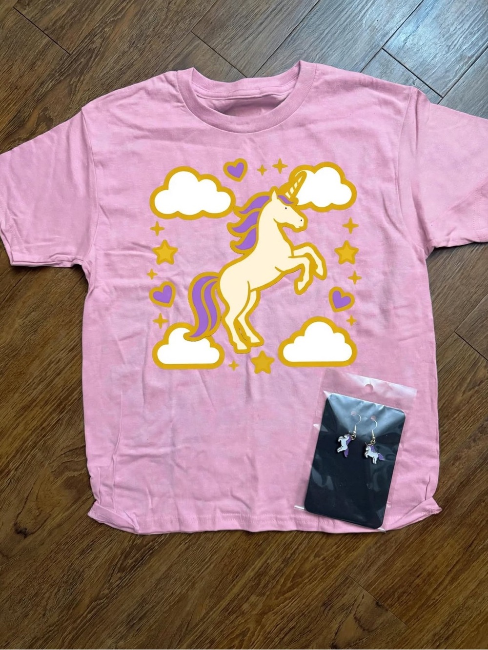 Pink Unicorn Graphic Kids T-Shirt with matching earrings